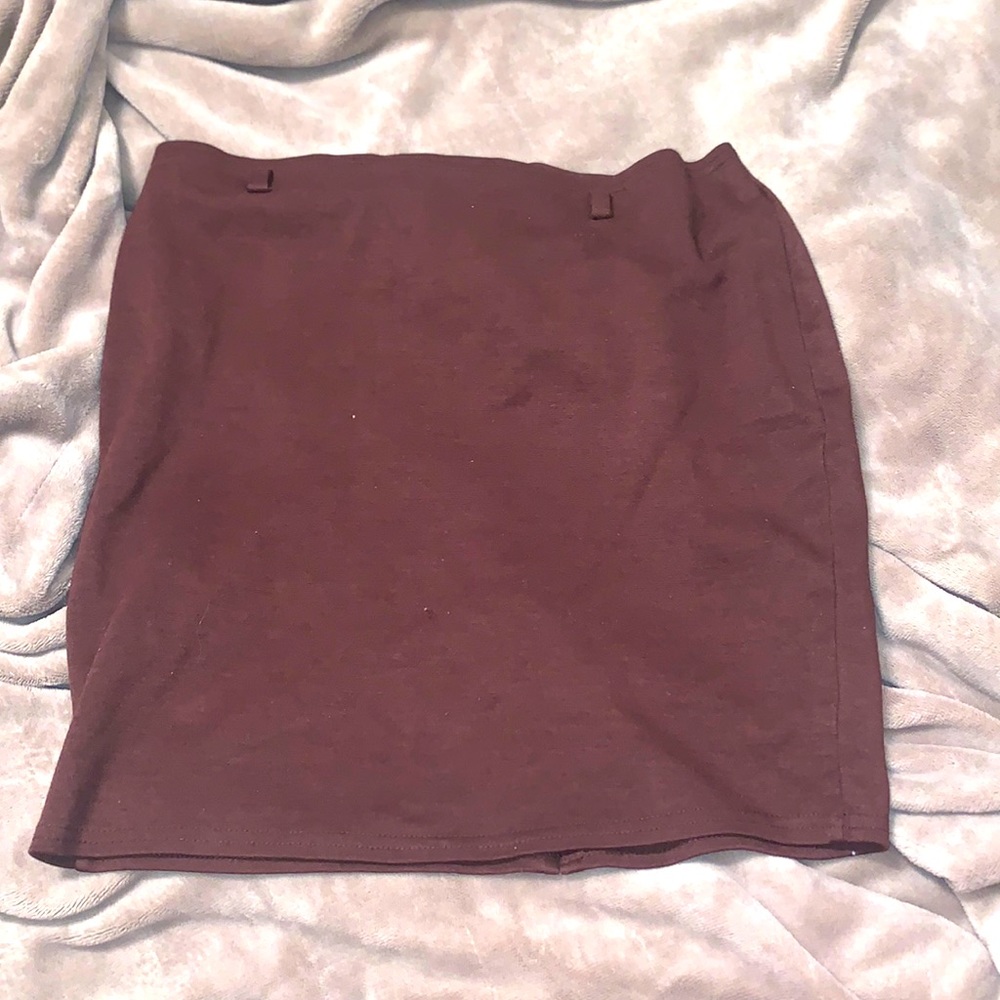 Chocolate brown skirt with split in the back.